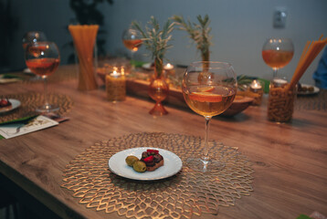 canapes with olive in a plate