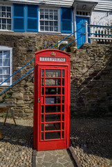 Red telephone box now used as a book lending facility