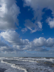 Fototapeta premium Rough sea and strong wind: show of waves and clouds