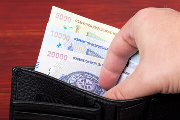 Uzbek money - sum in the black wallet