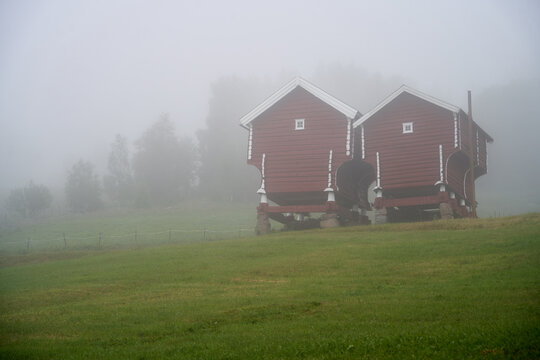  Traditional Stabbur in Foggy Uvdal Summer Keywords: Old, Red, Norwegian, Food Storage, Building, Stabbur, Traditional Architecture, Uvdal, Summer Weather, Fog, Rural Scene, Norway, Scandinavia,