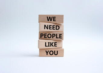 Hiring symbol. Wooden blocks with words We need People like You. Beautiful white background. Business and Hiring concept. Copy space.