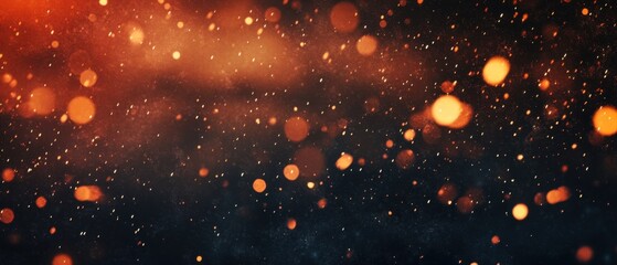 Fototapeta premium Abstract dark background with blurred golden bokeh lights and sparkling dust particles creating a magical and festive atmosphere Concept of celebration, holiday, and fantasy