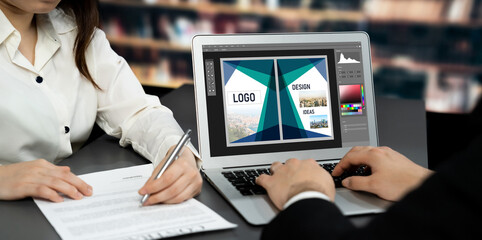 Graphic designer software for modern design of web page and commercial brisk ads showing on the...