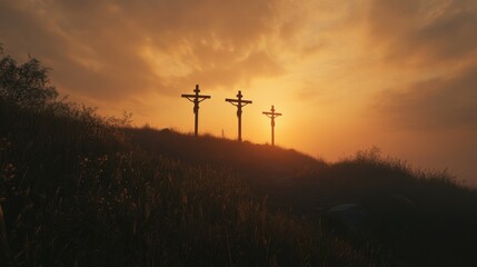 At sunrise there is a copy space image of three crosses being crucified on a hill