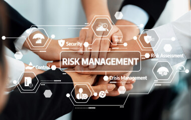 A group of hands symbolizing unity in risk management, surrounded by digital icons highlighting...