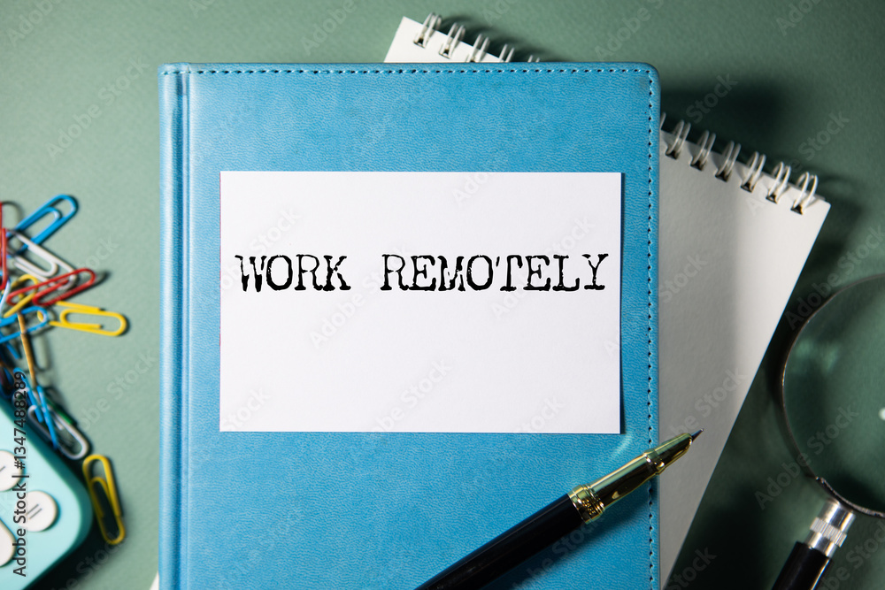 Poster work remotely text on notepad