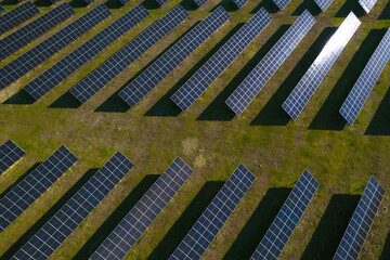 Solar panels park generating green energy electric.Green energy reduce carbon emissions and makes earth cleaner and more ecological.	