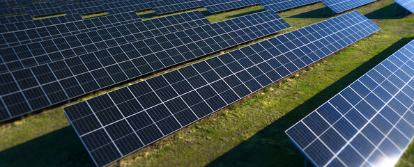 Solar panels park generating green energy electric.Green energy reduce carbon emissions and makes earth cleaner and more ecological.	