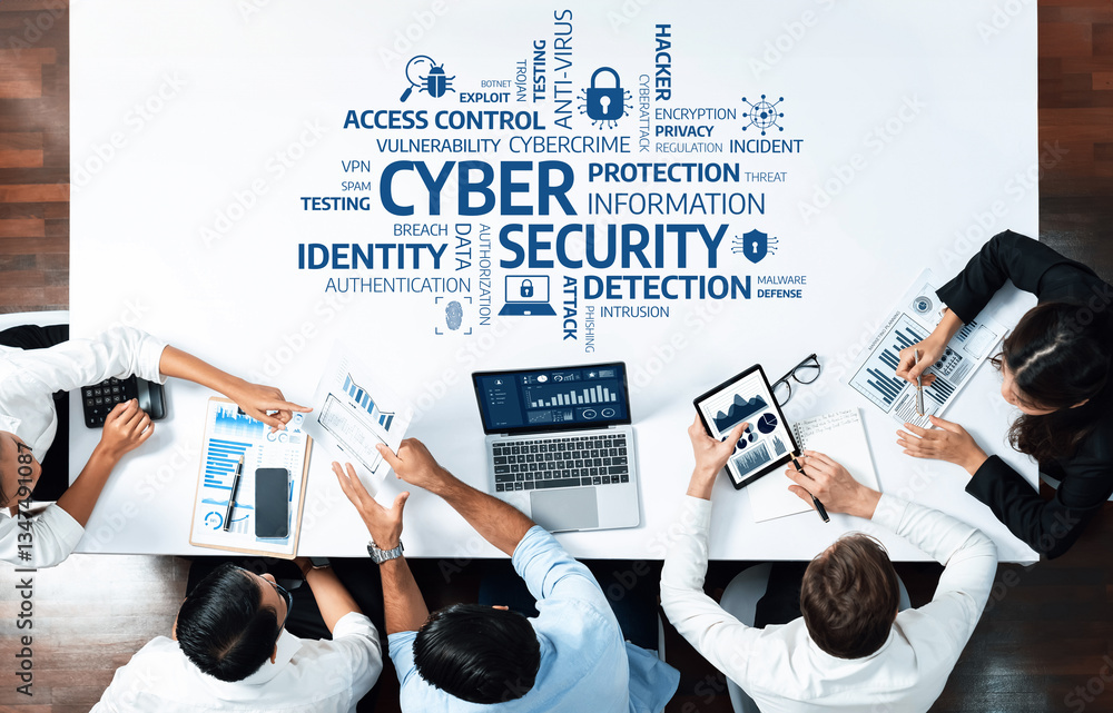 Poster teams collaborate in a modern office setting, focusing on strategies for enhancing cybersecurity, in