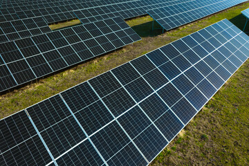 Solar panels park generating green energy electric.Green energy reduce carbon emissions and makes earth cleaner and more ecological.	
