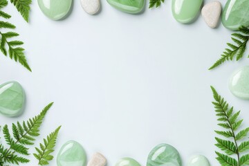 Elegant composition of polished green jade stones, soft moss, and delicate fern leaves creating a serene natural aesthetic in a tranquil setting