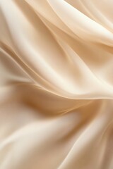 Obraz premium Elegant beige silk fabric with soft flowing folds and luxurious texture