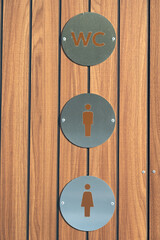Modern restroom signs blend functionality and design, highlighting accessibility and gender...