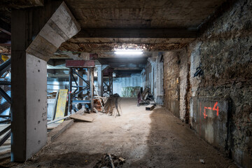Industrial basement with construction elements and materials