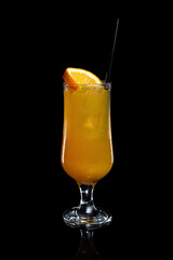 Orange fresh juicy in a glass on a black background