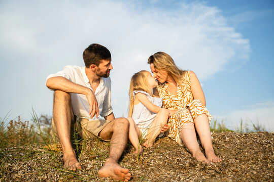 Family Enjoying a Relaxing Day at the Beach in Italy