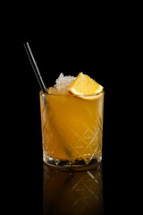 Screwdriver cocktail in glass on black background