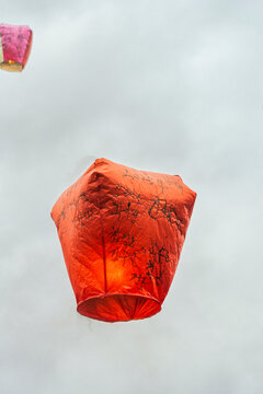 Chinese lanterns with wishes flying in the sky in Taiwan