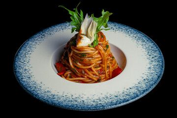 Plate on Pasta tomato sauce with artichoke on black background.