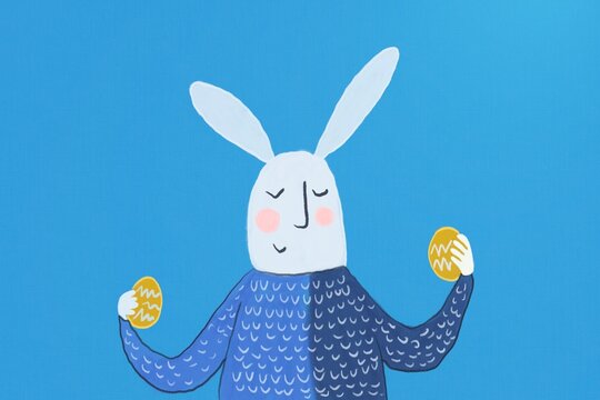 Whimsical Easter Bunny Holding Eggs in Festive Illustration