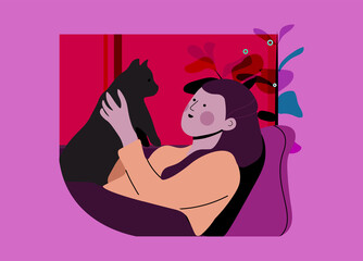 woman holding black cat in living room.