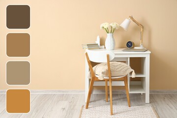 Comfortable workplace with ranunculus flowers near beige wall. Different color patterns