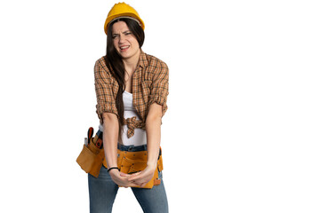 Naklejka premium Female construction worker stretching her wrists