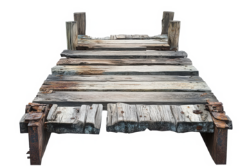 A weathered wooden walkway, a forgotten path leading to nowhere, showcasing the passage of time and the quiet beauty of decay with a stark white background.