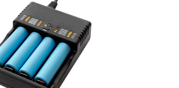 Charger with charge percentage and battery status indicator, 18650 lithium batteries inside, close-up, isolated background without shadow, cut out. With copy space.