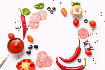 Frame made of fresh ingredients for preparing pizza on white background