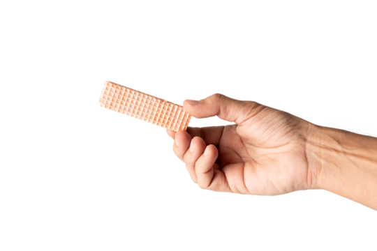 Male hand holding a pink waffle biscuit isolated no background