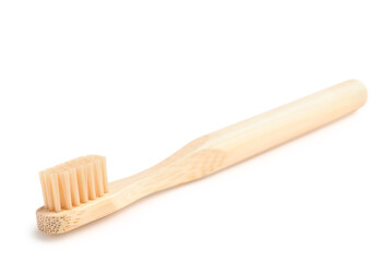 Bamboo tooth brush on white background