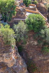 The rocky, sheer-sided limestone cliffs of Ronda Gorge (El Tajo de Ronda) plummet 390 feet (120...