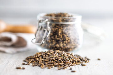Milk thistle seeds on kitchen table.