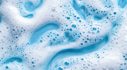 Blue swirls and bubbles in a white, foamy liquid. Dynamic, textured pattern. Vibrant blue contrasts with the white foam. A fresh, clean, and airy atmosphere.