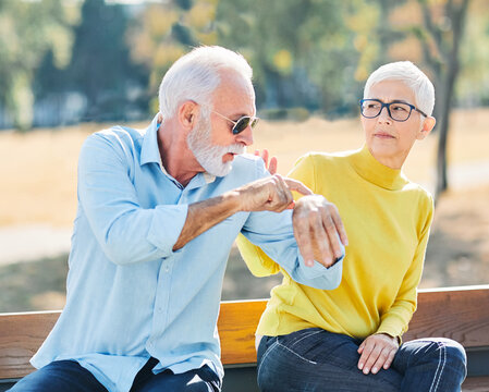 woman man senior couple retirement together elderly arguing problem conflict relationship angry argument divorce outdoor active park love old - Powered by Adobe
