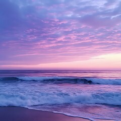 Fototapeta premium Soft waves shimmer beneath the golden light of a peaceful sunset image