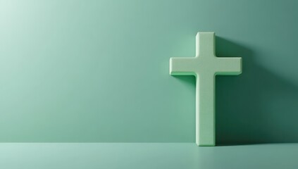 Obraz premium Green cross on teal wall, minimal background, faith concept, religious imagery