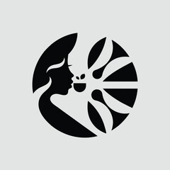 Elegant Black and White Silhouette of a Woman Inhaling a Floral Scent