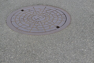 Round Manhole Cover with Spider Web Design