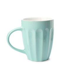 Blue ceramic cup on white background