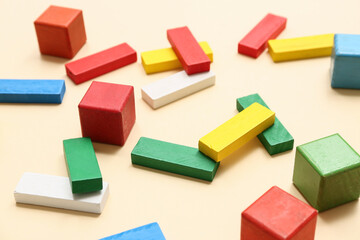 Fototapeta premium Different colorful building blocks on color background