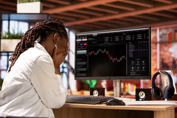 Sad day trader reacting with frustration after losing money in cryptocurrency investment due to rug...
