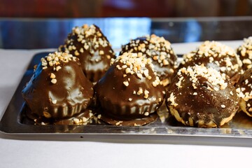 Gourmet Chocolate-Coated Tartlets with Chopped Nuts