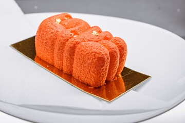 Luxury Red Mousse Dessert with Gold Leaf on a Golden Tray