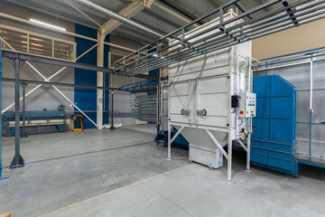 metal painting shop, parts ready for painting, perforated metal profiles