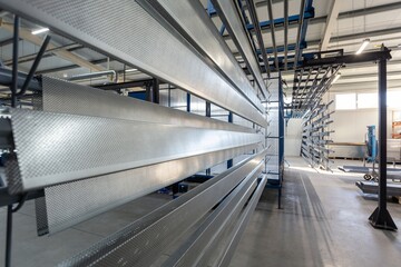 metal painting shop, parts ready for painting, perforated metal profiles