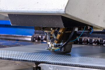 sheet metal cutting shop, industrial metal processing, close-up