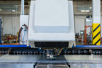 sheet metal cutting shop, industrial metal processing, close-up